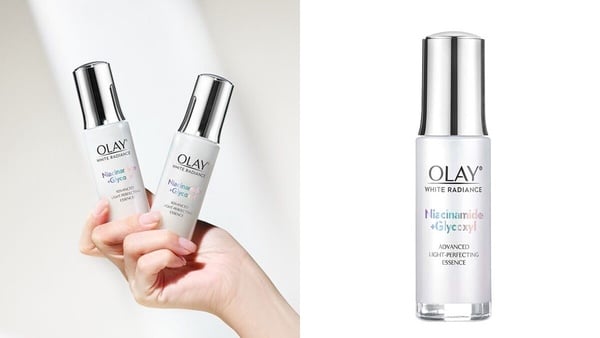 OLAY 水感透白光曜精華小白瓶的白色滴管瓶產品圖，能改善肌膚蠟黃與斑點。