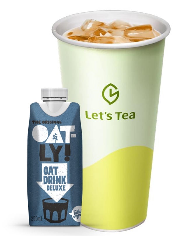 全家 OATLY 燕麥奶茶，濃郁的燕麥奶搭配經典奶茶風味，令人回味無窮
