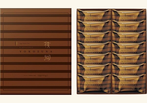 Suger Butter Tree 白巧克力夾心麥片餅乾的巧克力色禮盒包裝，設計簡約高雅