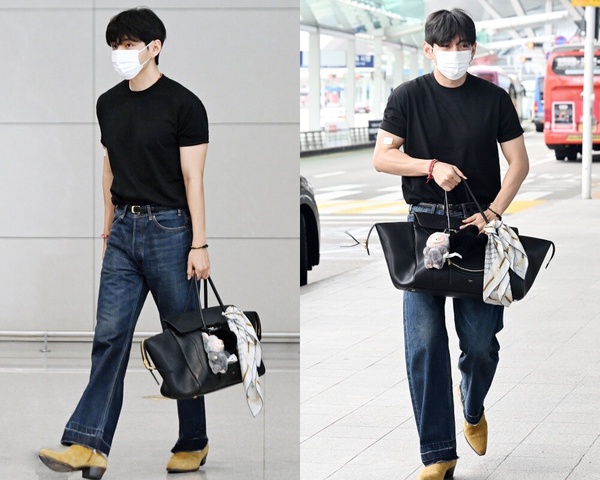 BTS 成員 V (金泰亨) 手提黑色 CELINE Smiling Luggage 手袋，並以絲巾點綴，展現其優雅時髦的魅力。