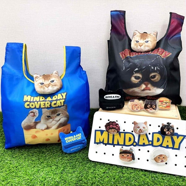 跩貓來襲！7-11「MIND.A.DAY周邊」登場，磁吸手機支架、手機掛繩、吊飾購物袋盲盒必收
