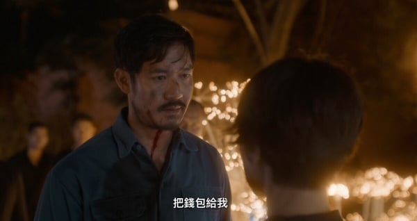 《回魂計》角色阿龐的特寫，他表情嚴肅地望著前方，暗示其與詐騙集團及三清太極會有著不為人知的關聯。